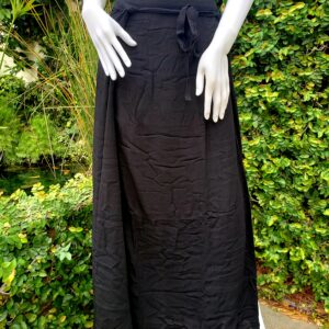 A black dress is shown on display outside.